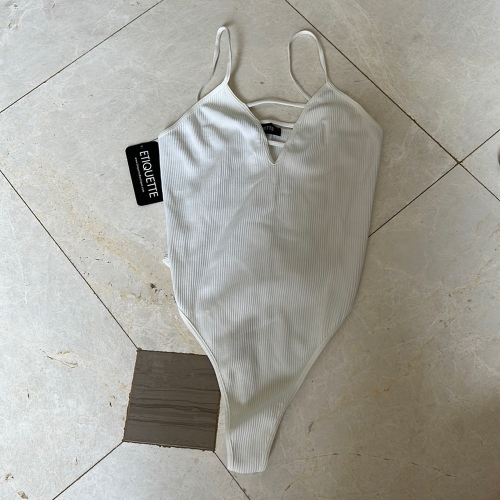 White bodysuit never worn